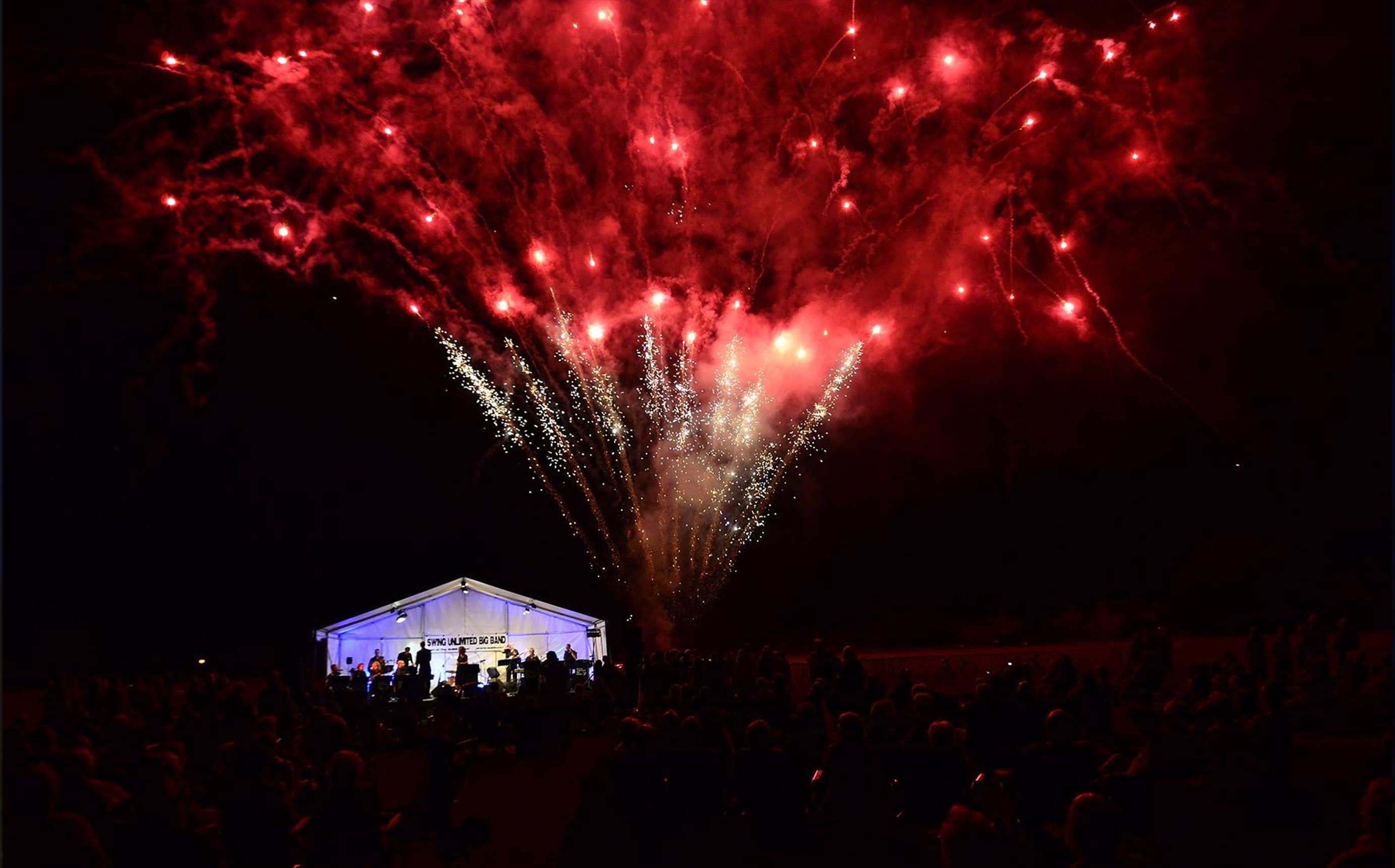 A Firework Solutions Limited display, a large scale wedding display with bright red fireworks